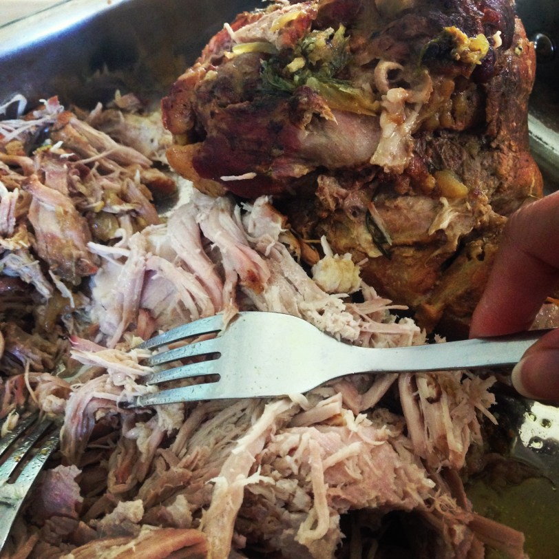 After several hours of slow cooking, we are ready to pull the pork!